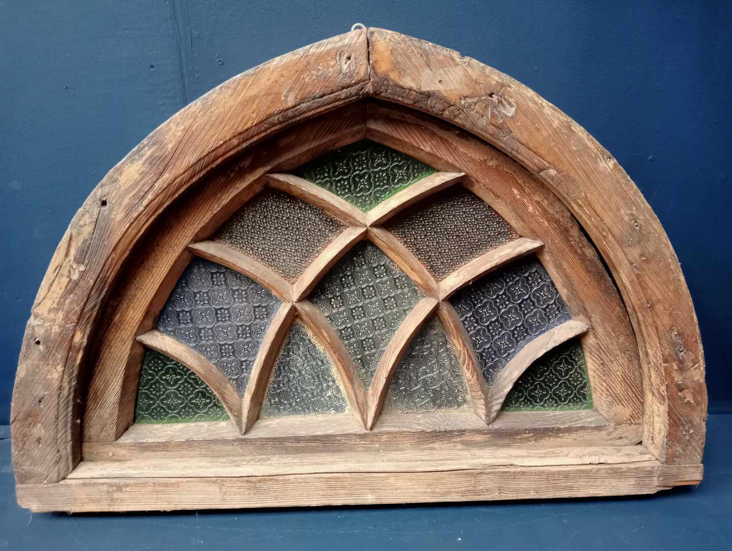 18th C. Arched Cottage fanlight with coloured glass and curved lattice bars
