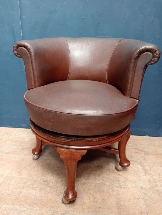 1920s revolving desk chair on cabriole legs with casters
