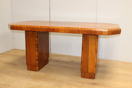 Art deco style walnut desk raised on square supports