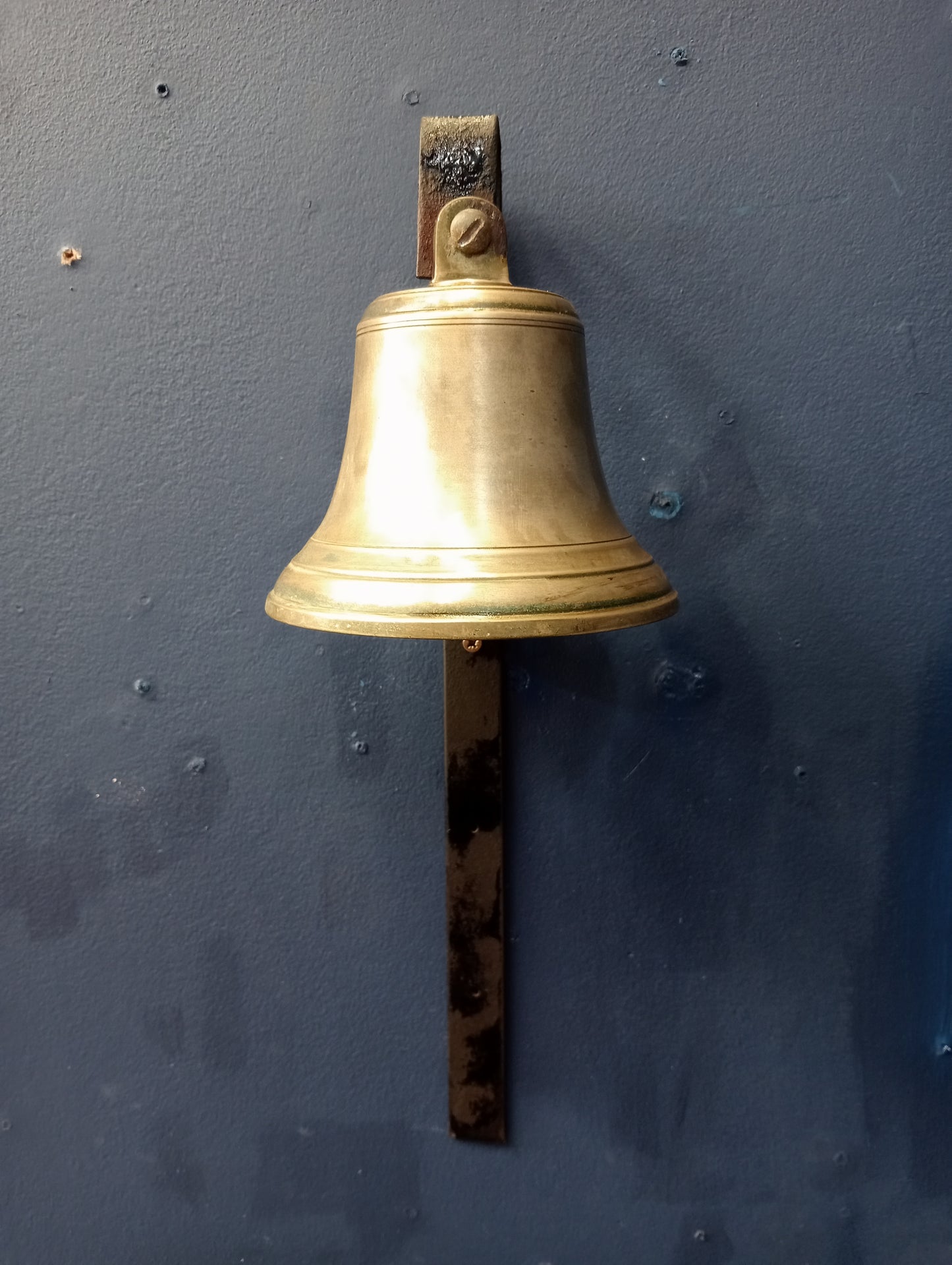 Brass bell and bracket