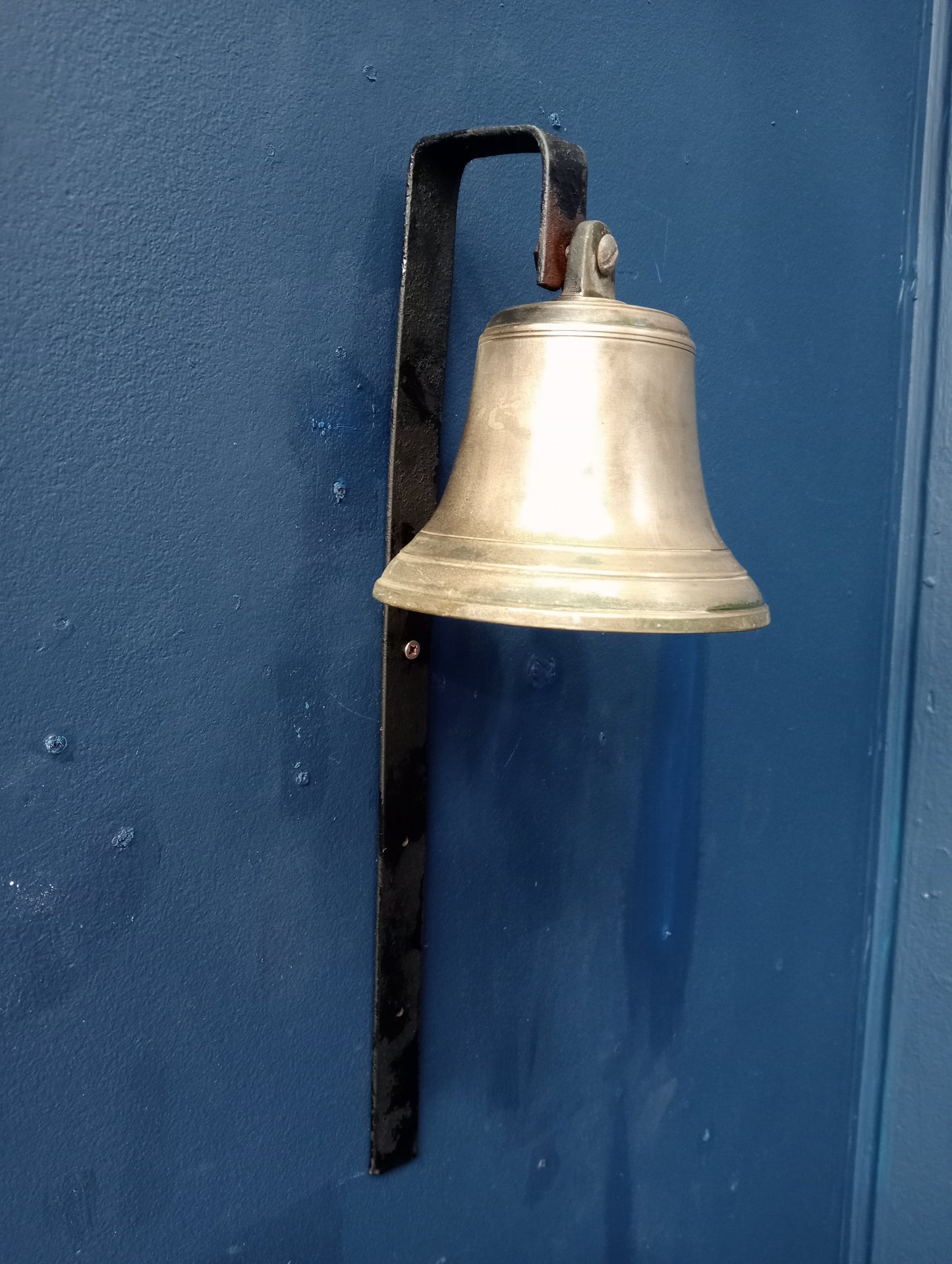 Brass bell and bracket