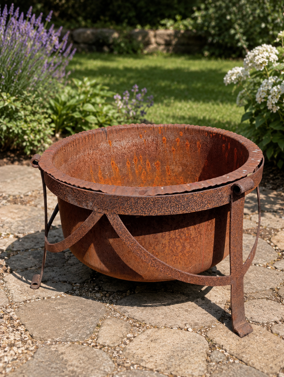 Cast iron cauldron on 3 leg scroll base