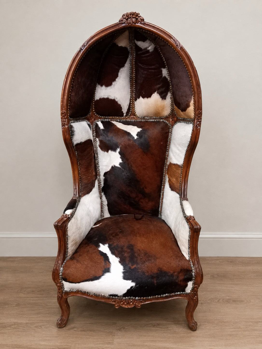 Mahogany & Cowhide Upholstered Porter’s Chair