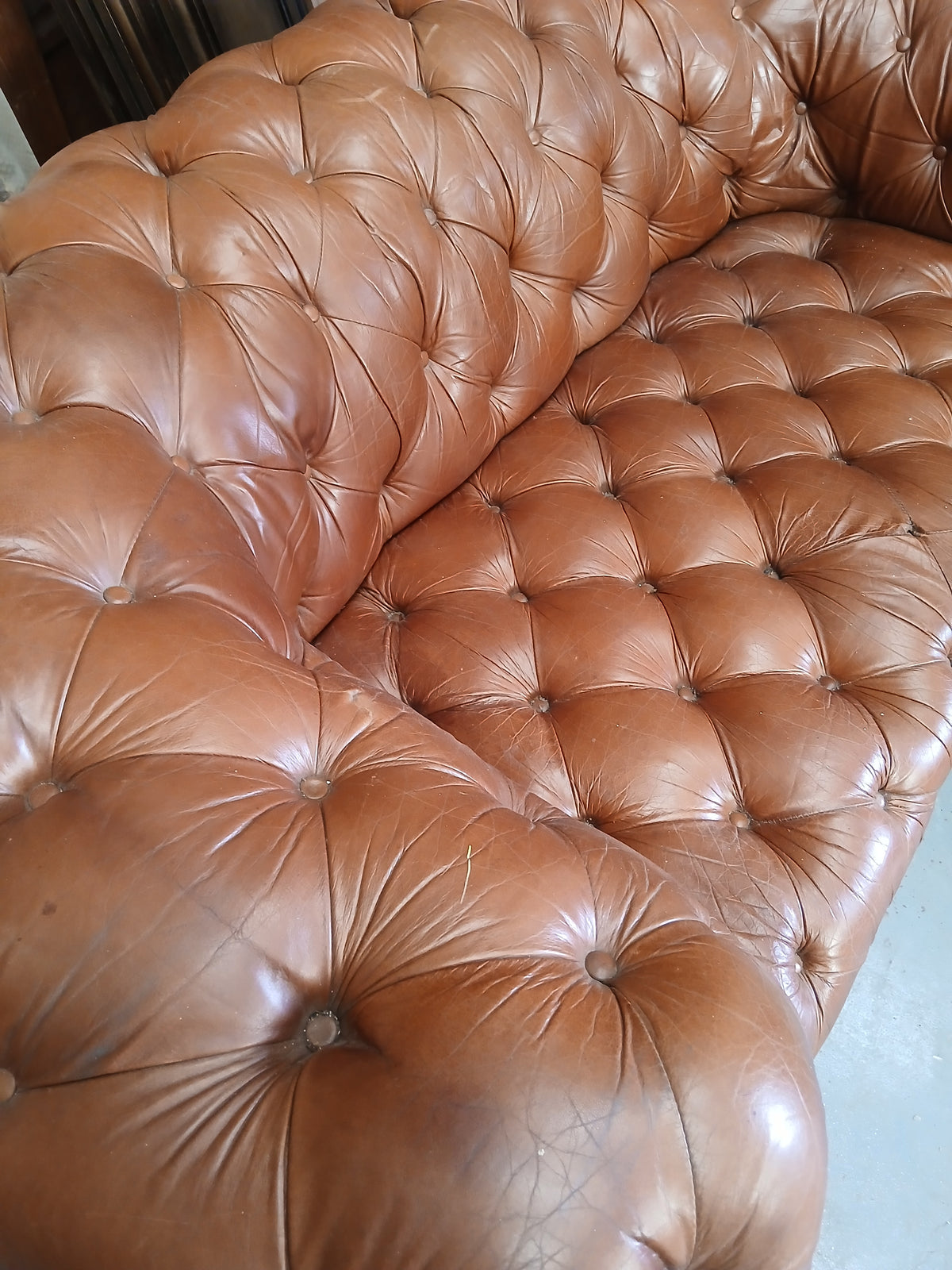 Whisky Brown Leather Deep-Buttoned Chesterfield Sofa Description: