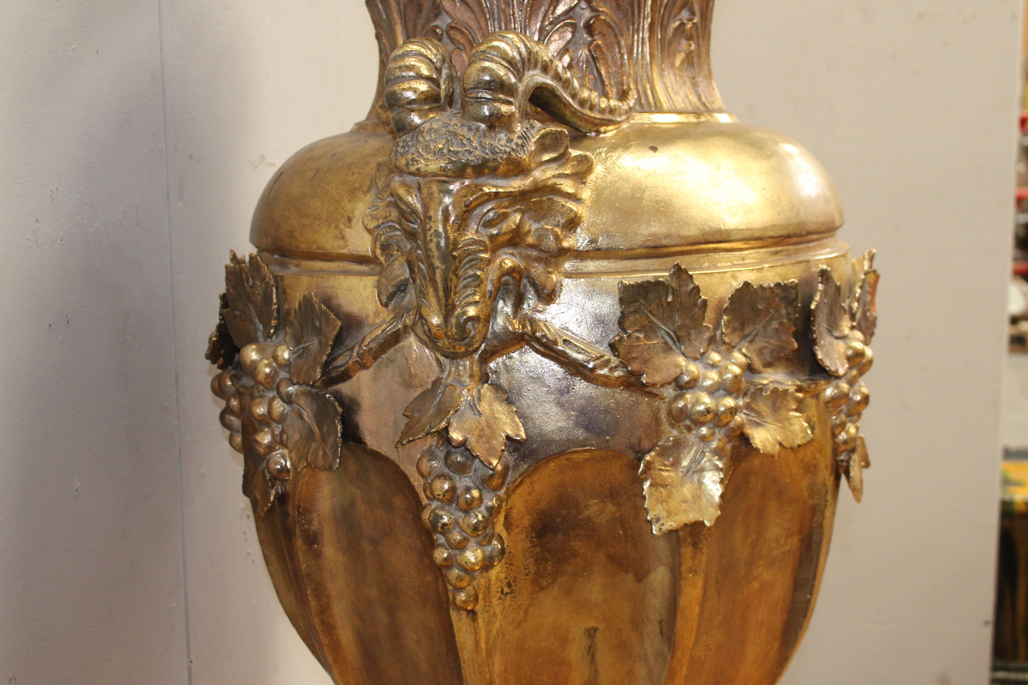 Handmade Ceccarelli gold Italian ceramic urn on base decorated with grapes and rams head