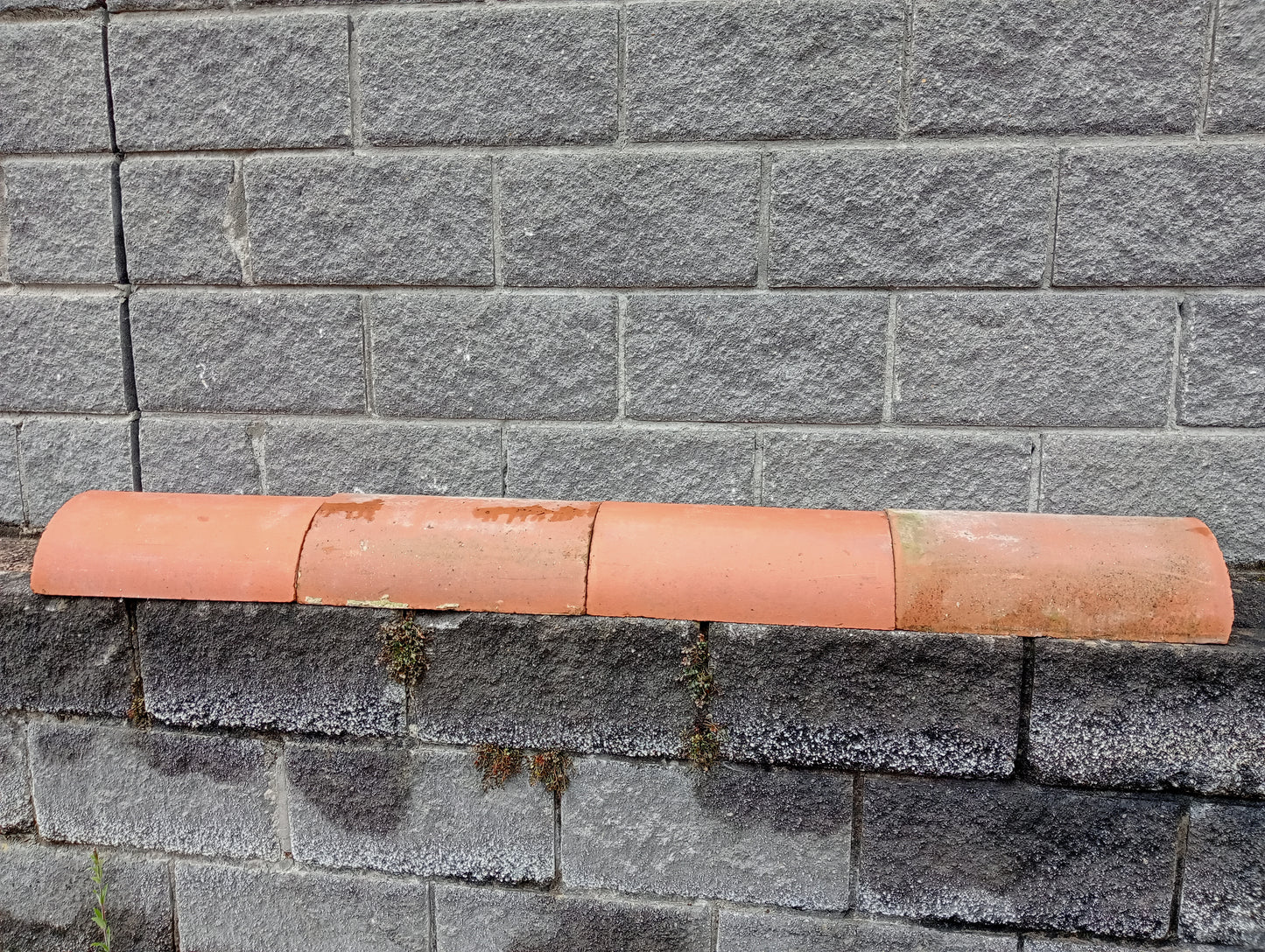 Lot of 15 Terracotta half round wall copings