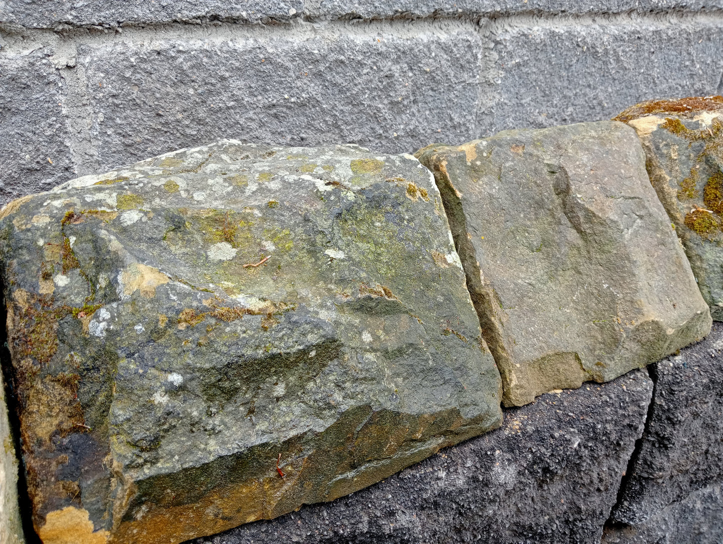 Lot of rustic Victorian Yorkshire stone triangular wall tops