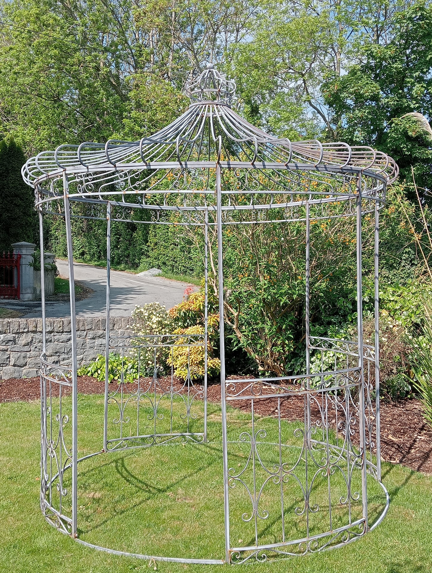 Metal garden gazebo with scroll design