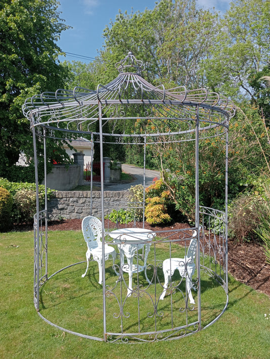 Metal garden gazebo with scroll design