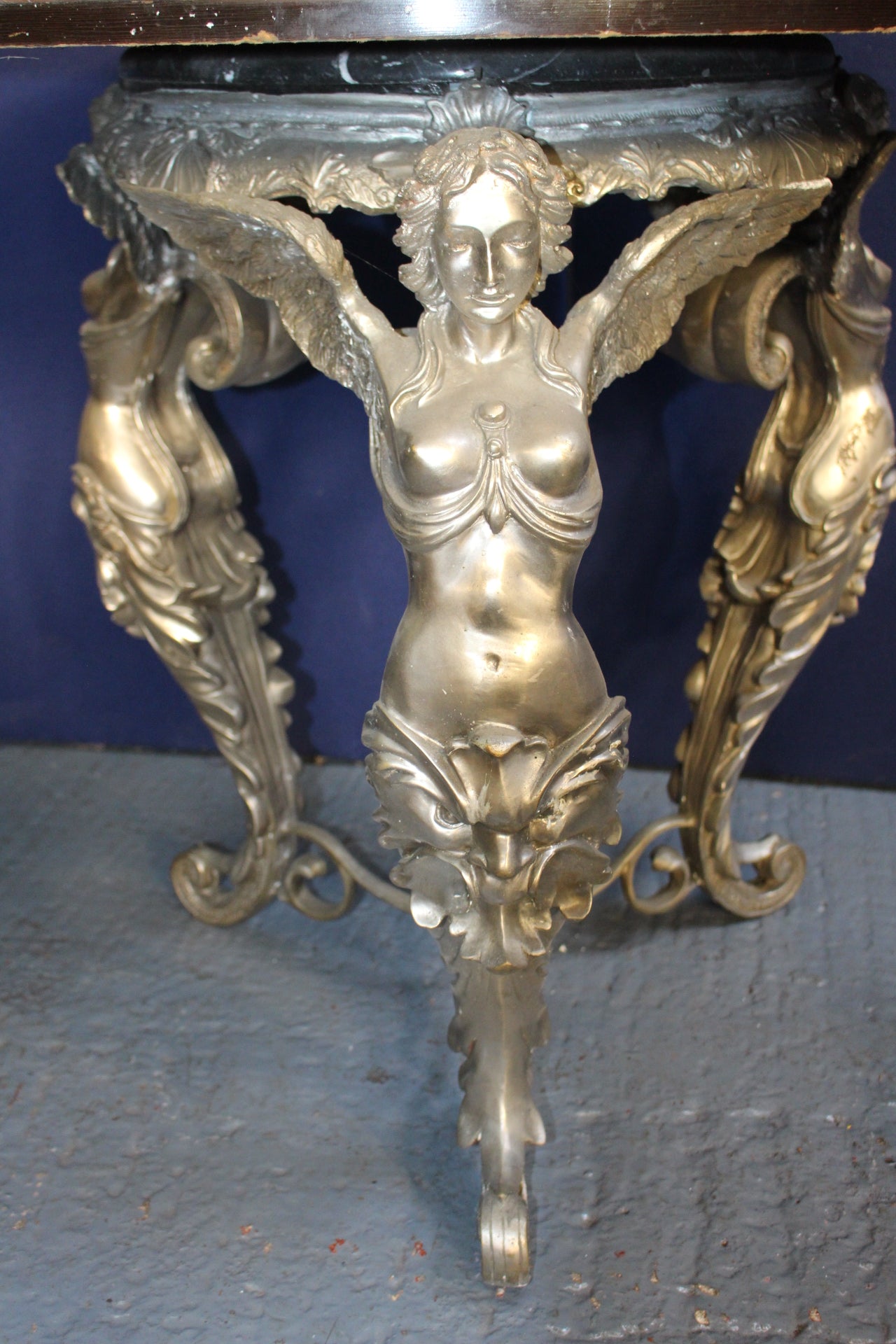 Nickle bronze three legged table angels holding marble round top