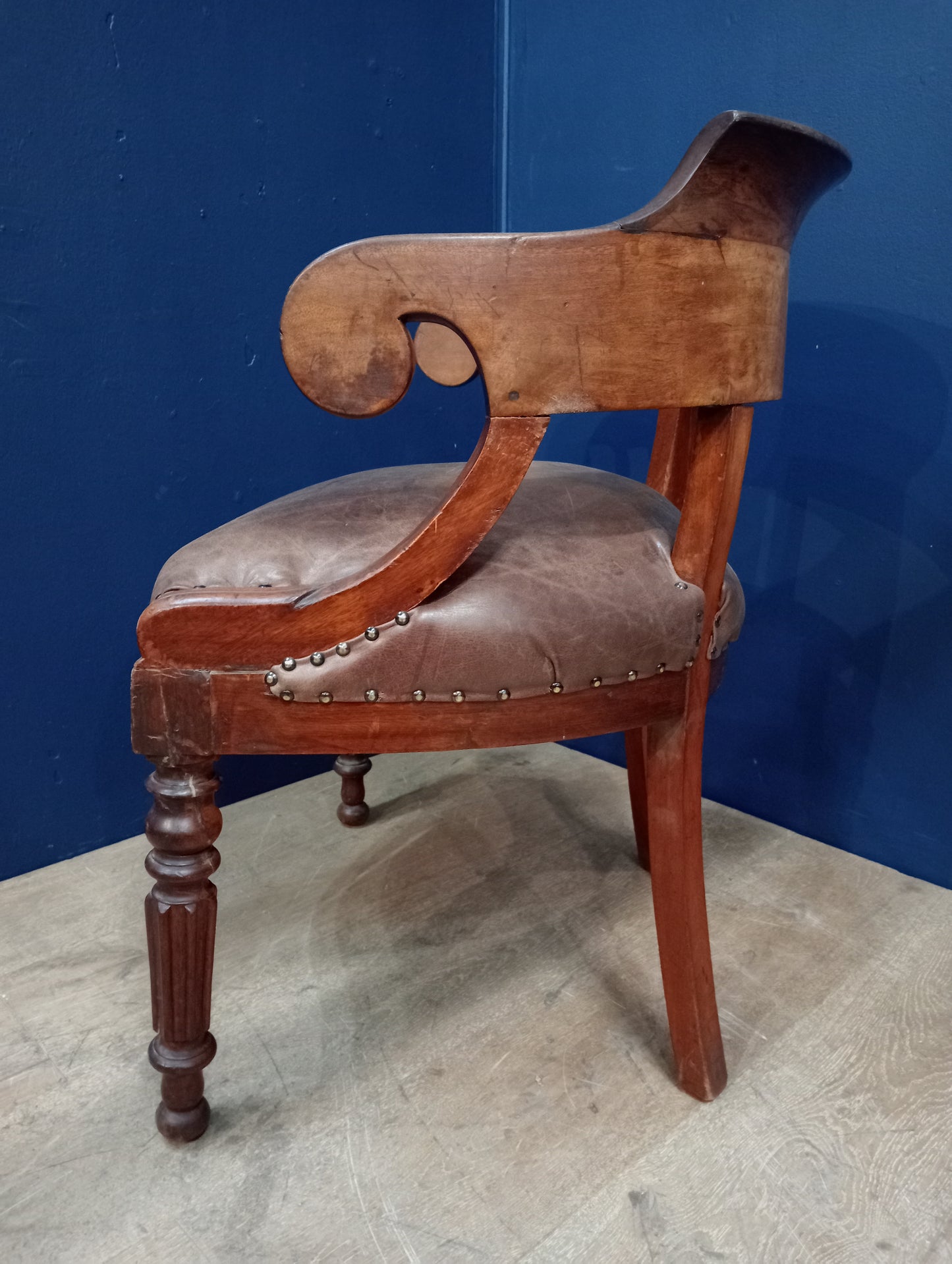 Oak captains chair antique leather seat