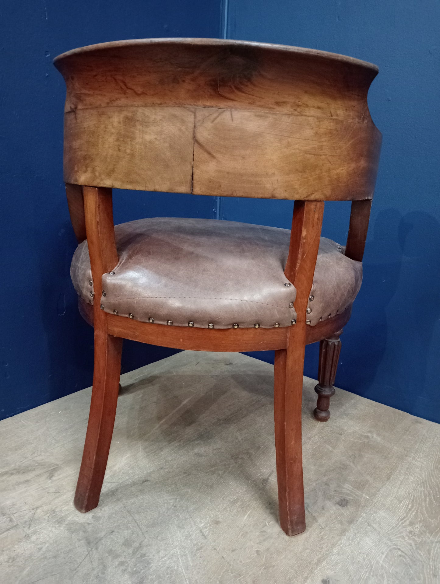 Oak captains chair antique leather seat