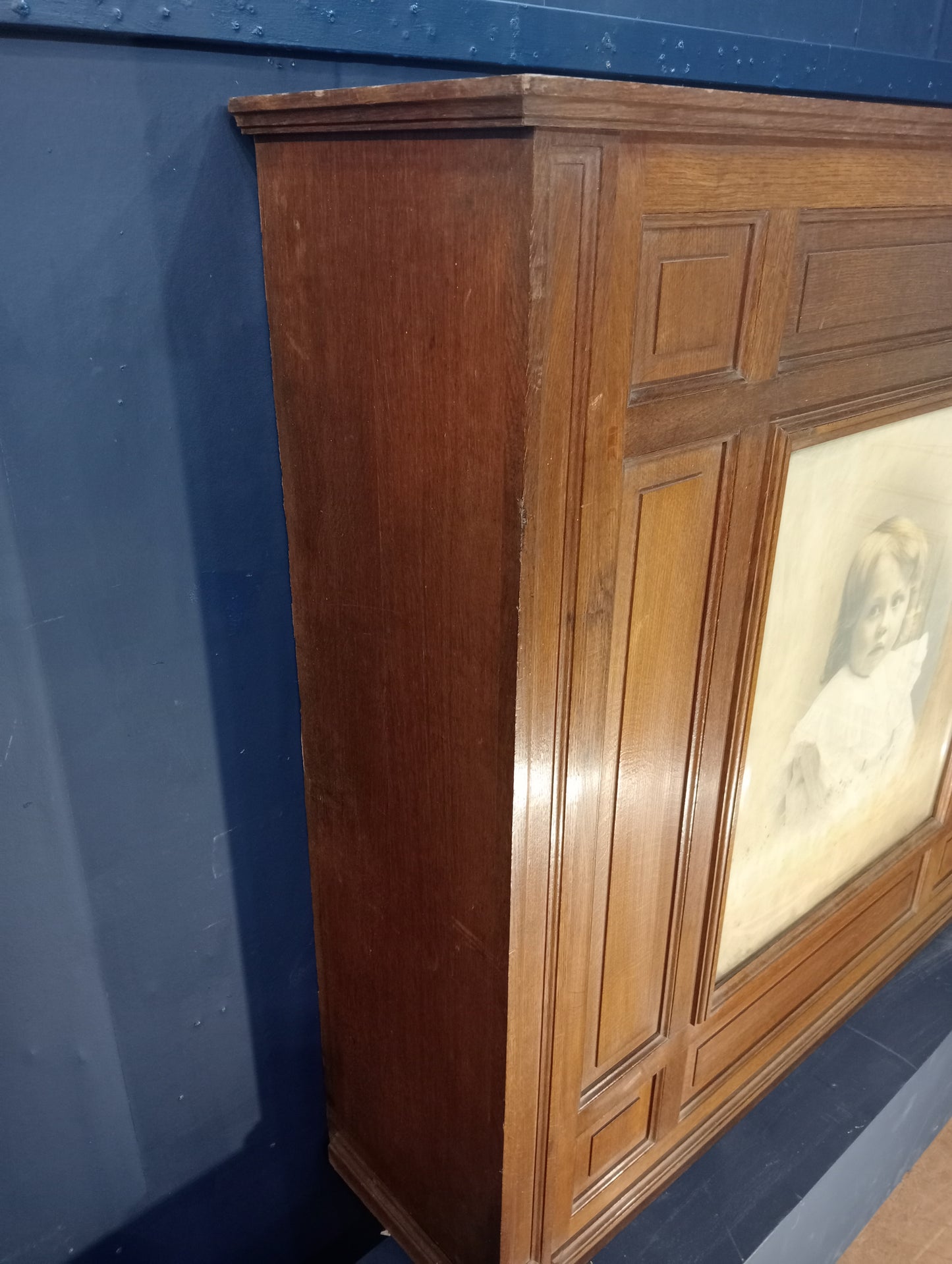 Oak overmantle with child portrait