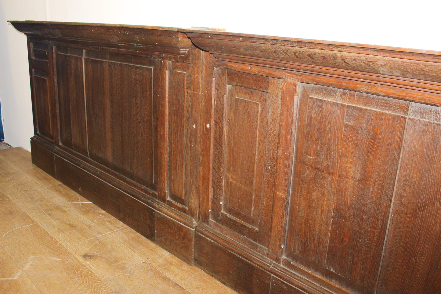 One lot of 3 metre oak wall panelling with one secretive opening door