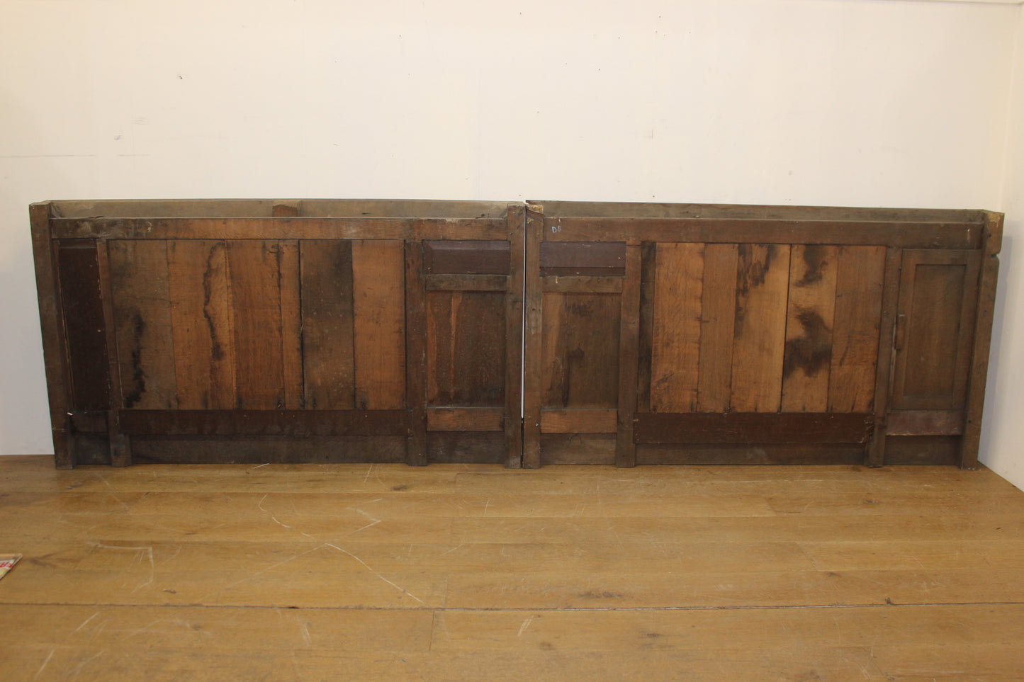 One lot of 3 metre oak wall panelling with one secretive opening door