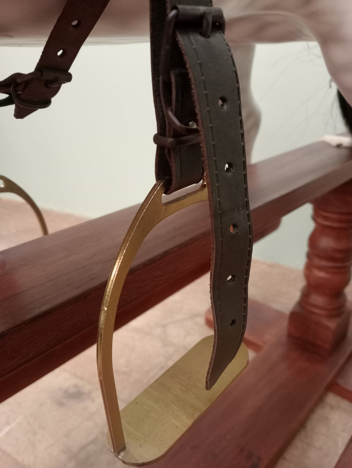 Painted dapple grey rocking horse with leather reins and saddle