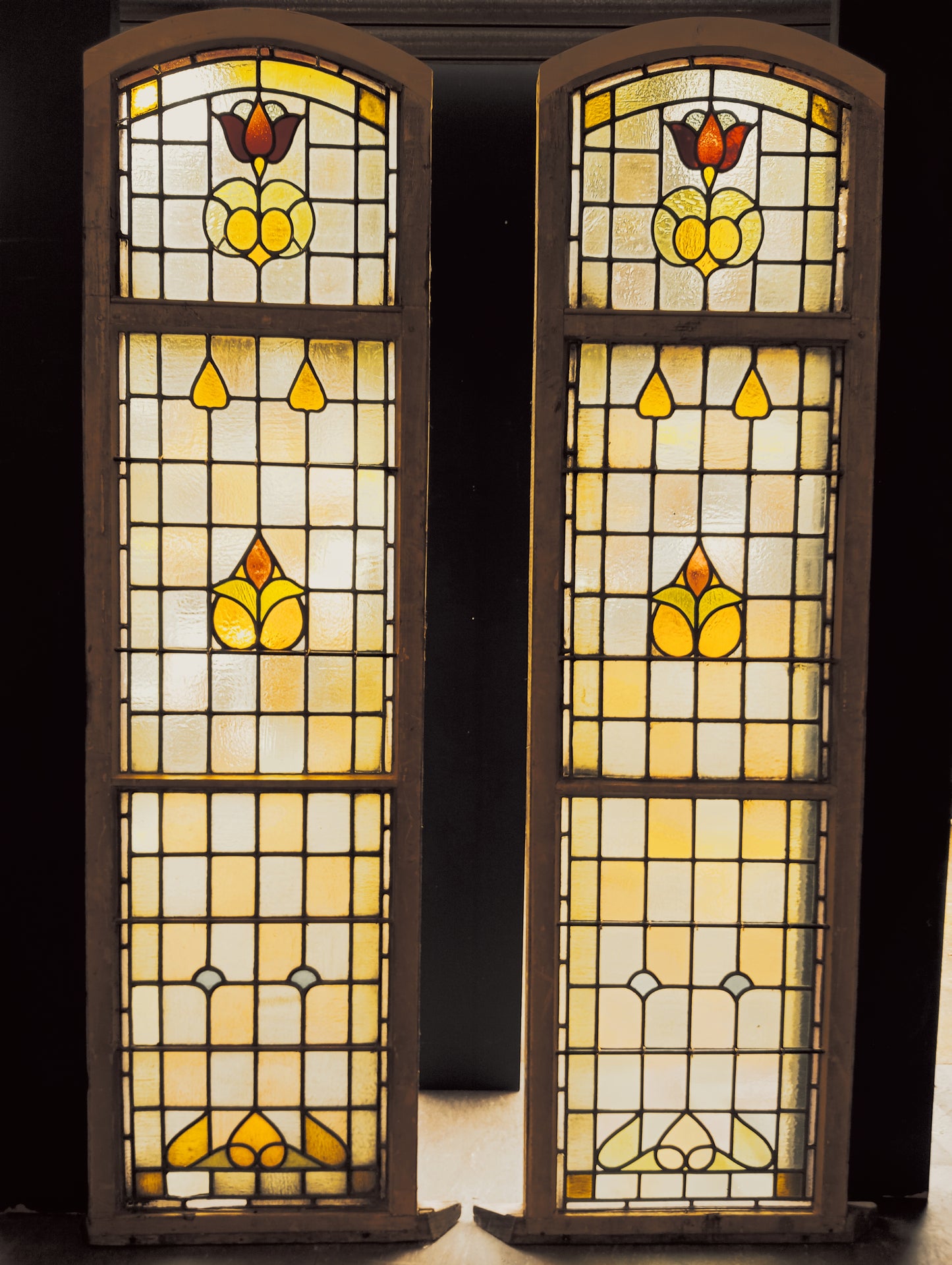 Pair of arched 19th C stain glass and leaded windows