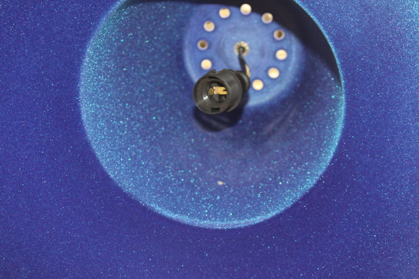 Pair of enamel hanging light shades with blue fabric