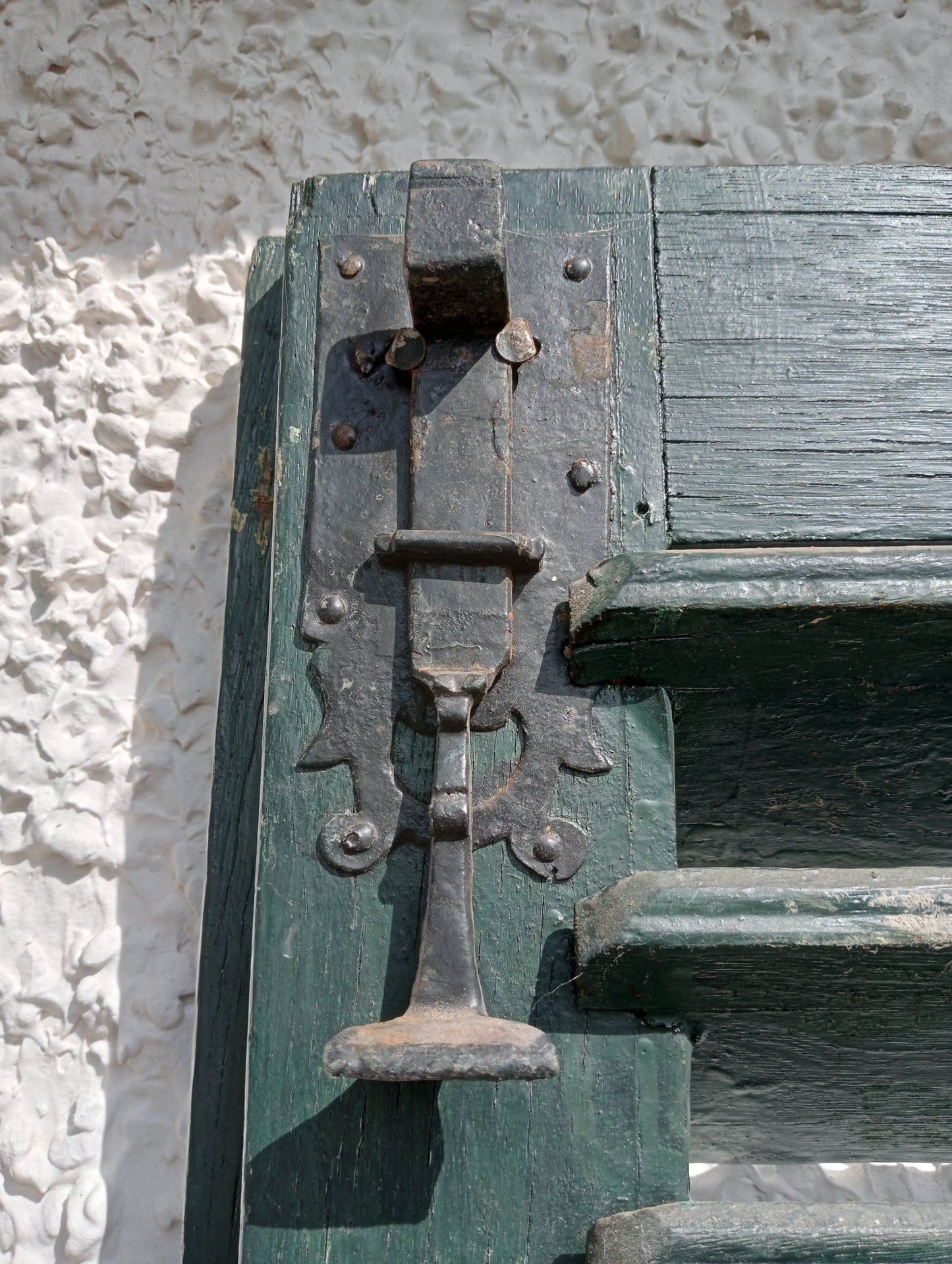Pair of french style green louvred window shutters