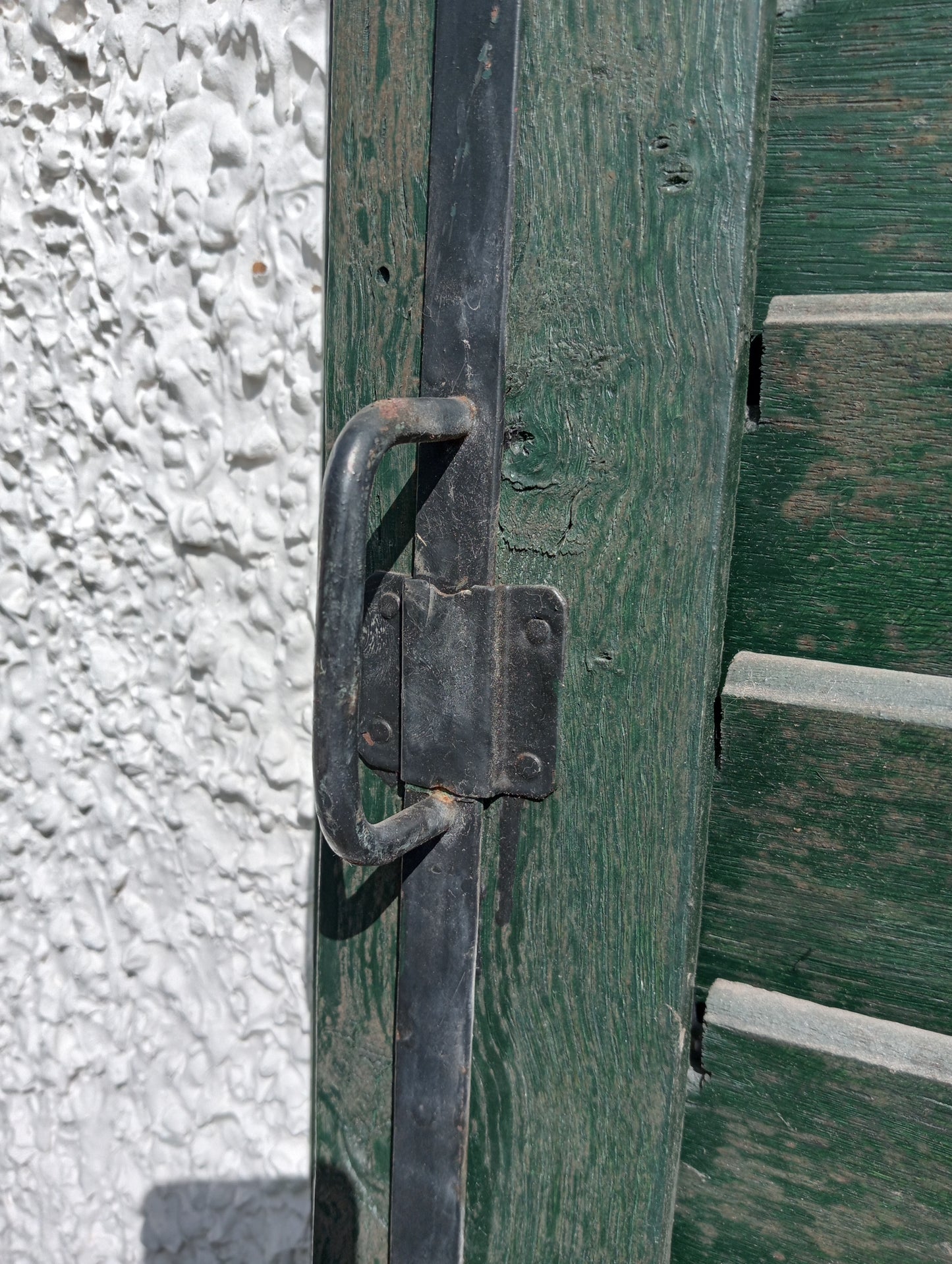 Pair of french style green louvred window shutters
