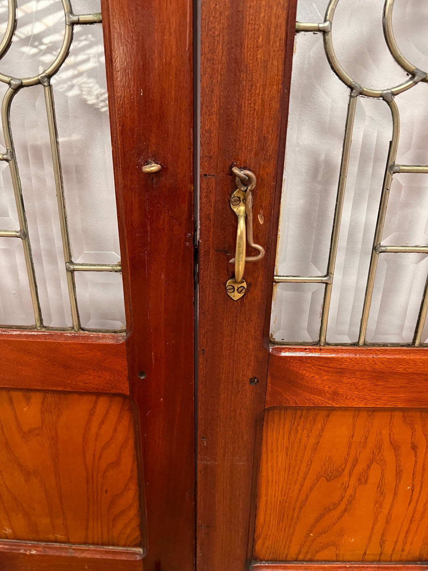 Pair of mahogany bar hatched doors with leaded bevelled glass