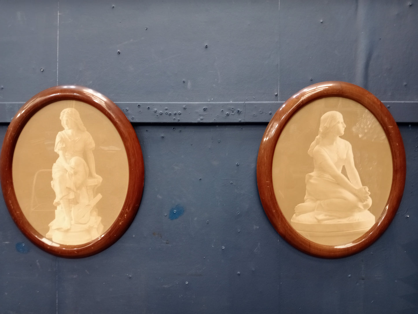 Pair of oval statue prints