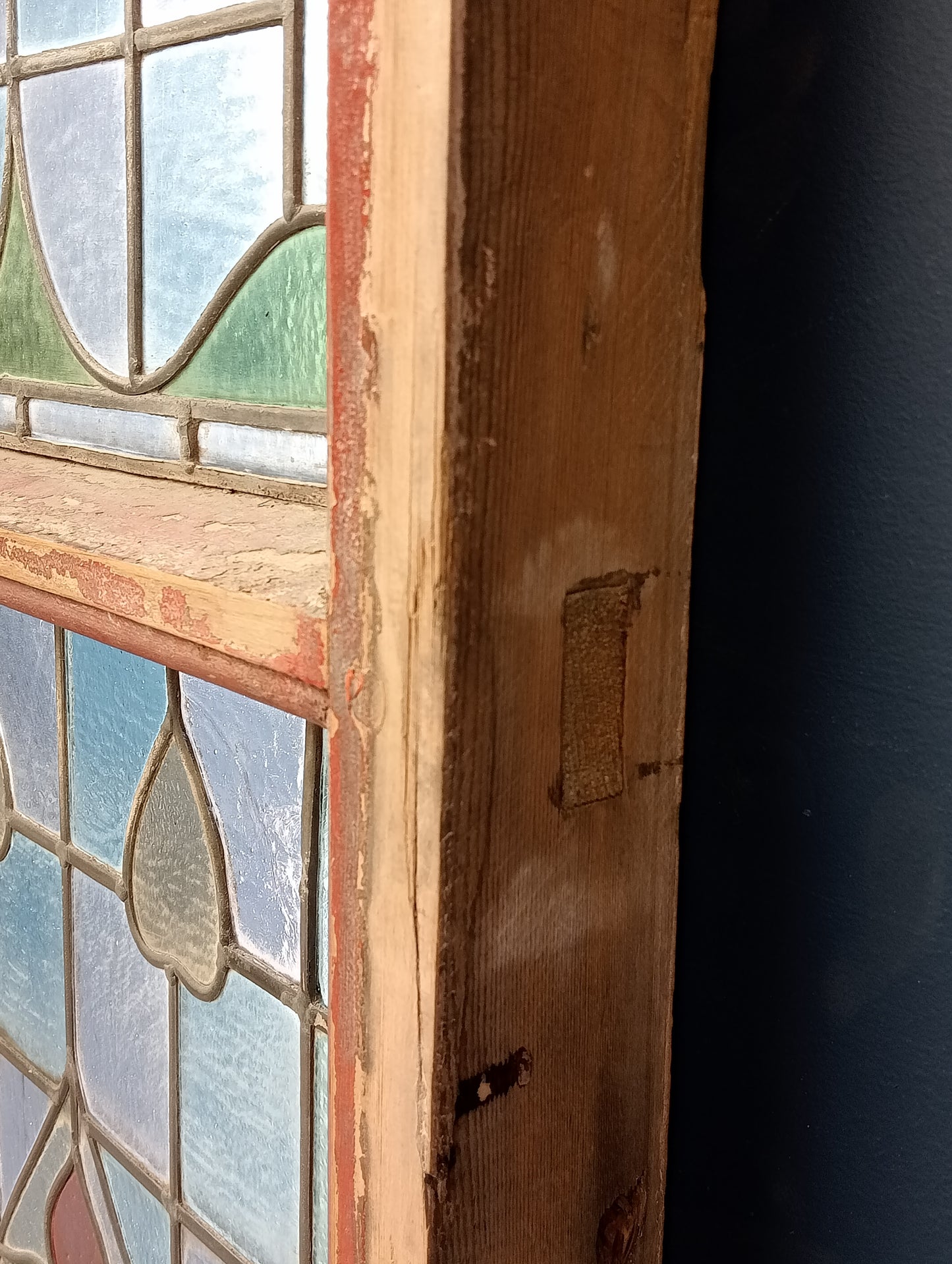 Pair of reclaimed arch topped stained glass windows