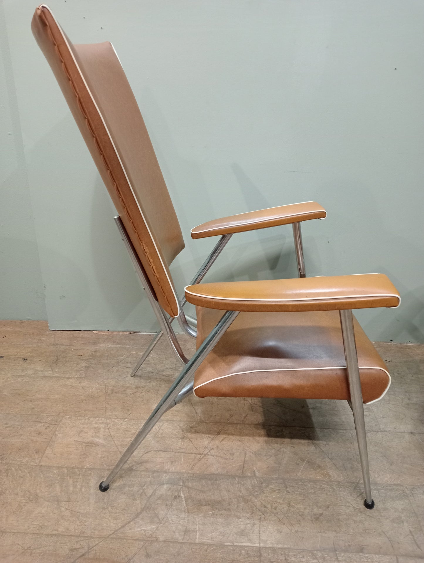 Pair of retro chrome leather armchairs
