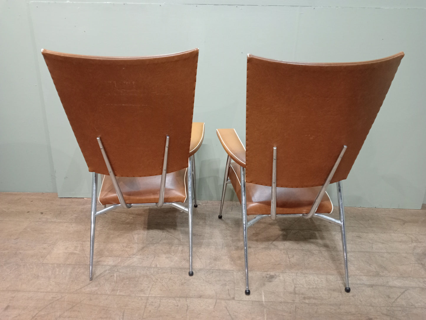 Pair of retro chrome leather armchairs