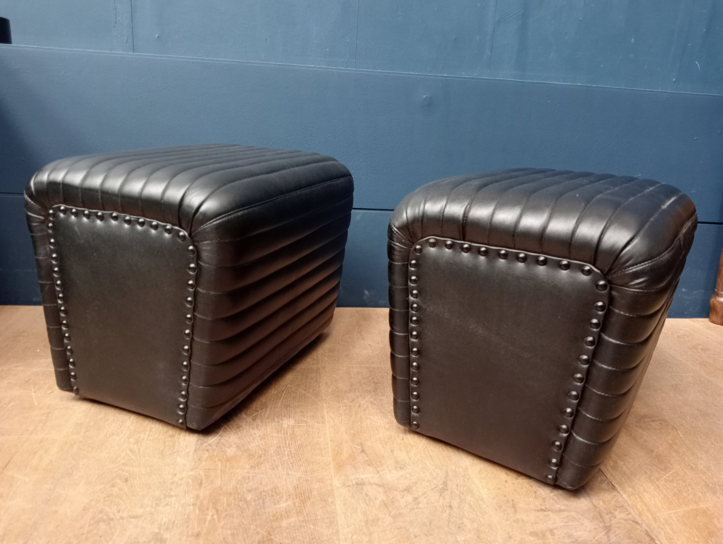 Pair of ribbed leather stools low