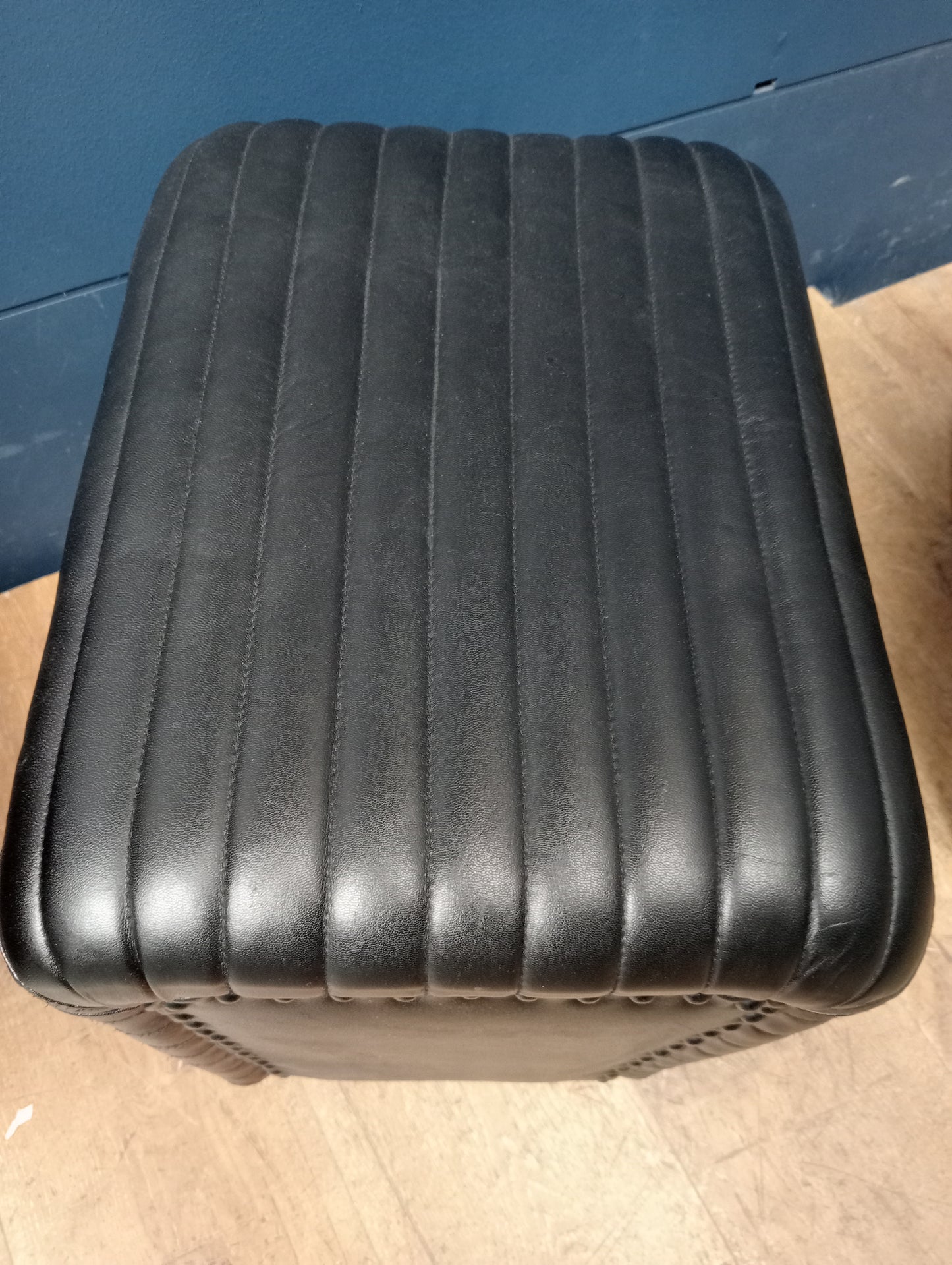 Pair of ribbed leather stools low
