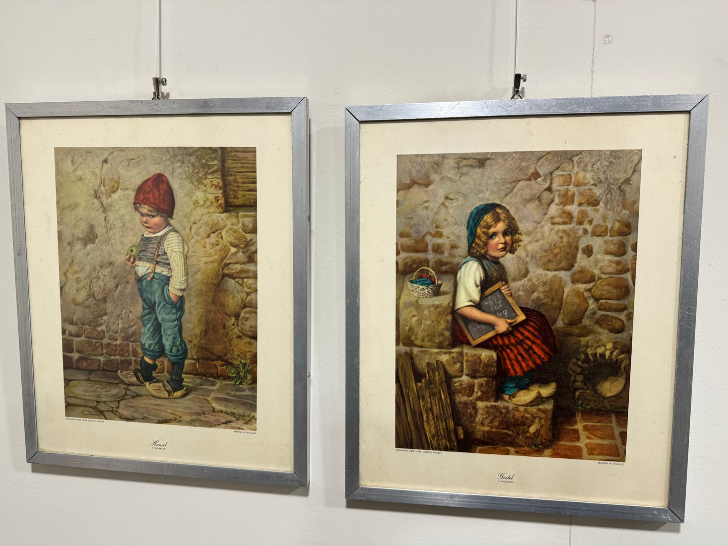Pair of silver frame Hansel and Gretel pictures