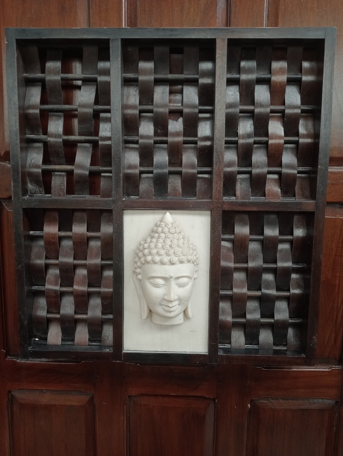 Pair of tribal carving ladies and gents budda head