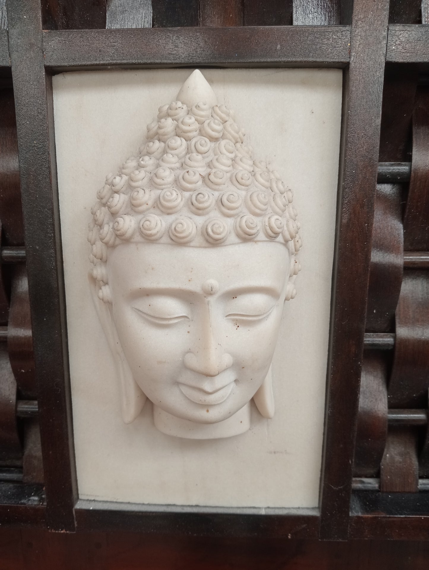 Pair of tribal carving ladies and gents budda head