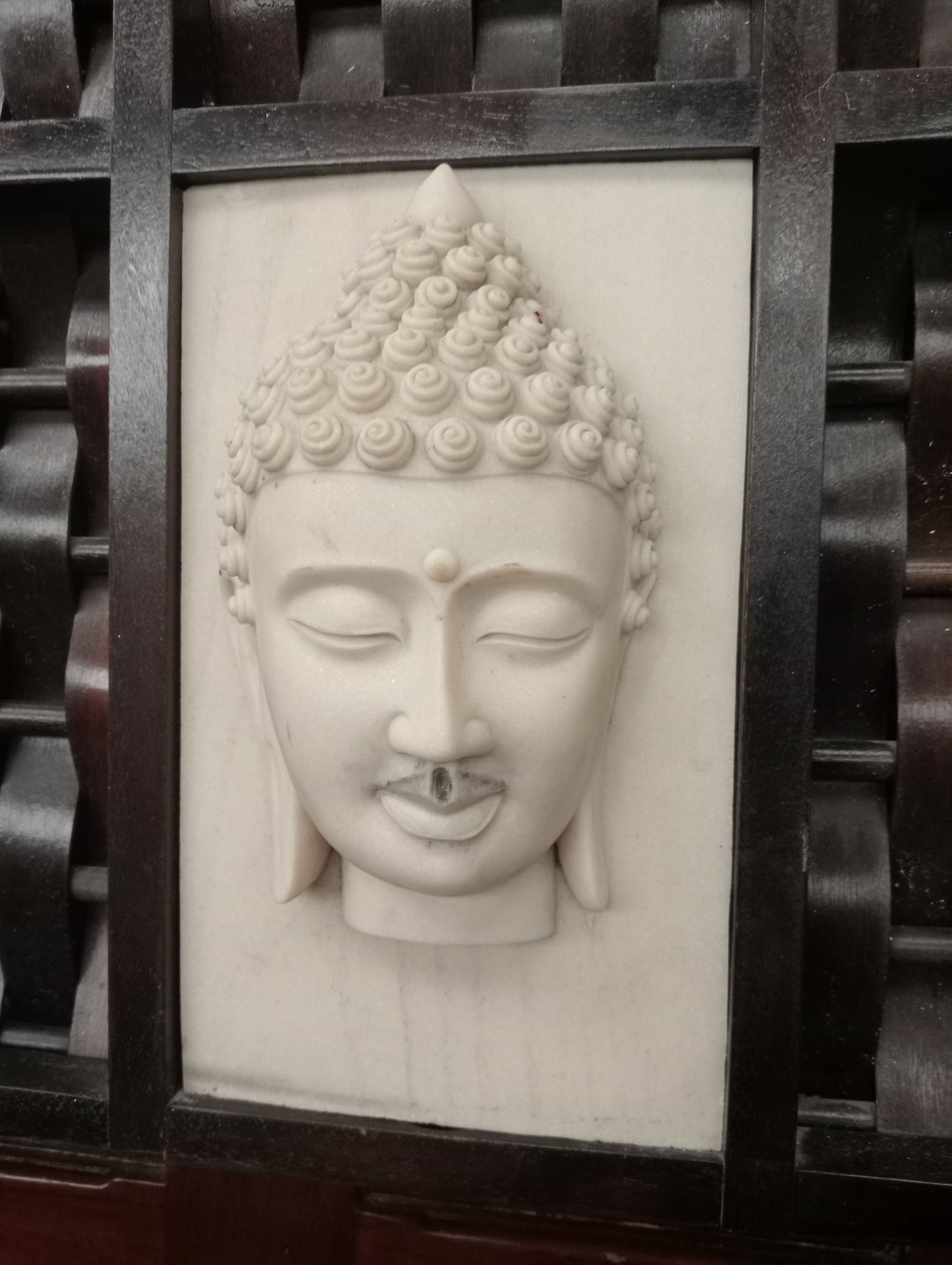 Pair of tribal carving ladies and gents budda head