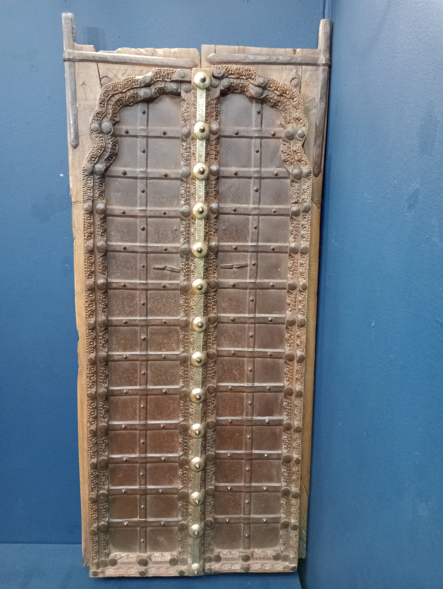 Pair of wooden shutters brass fittings hand carved