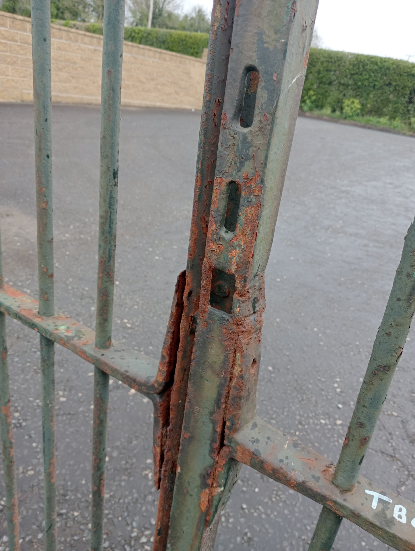 Pair of wrought iron gates spiked finials