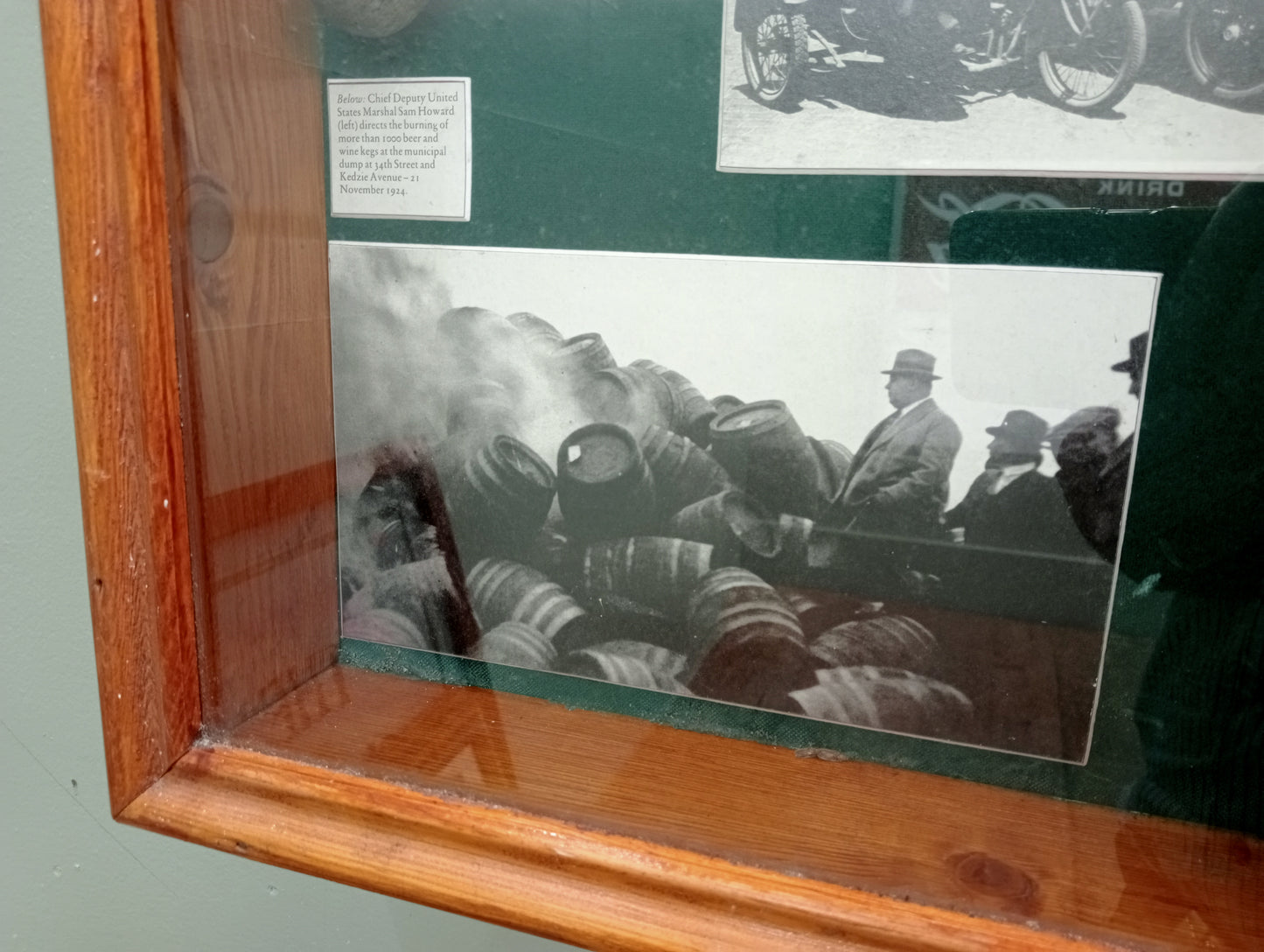 Prohabition glazed showcase 1924 showing confession of prohibited beer and wine in Chicago