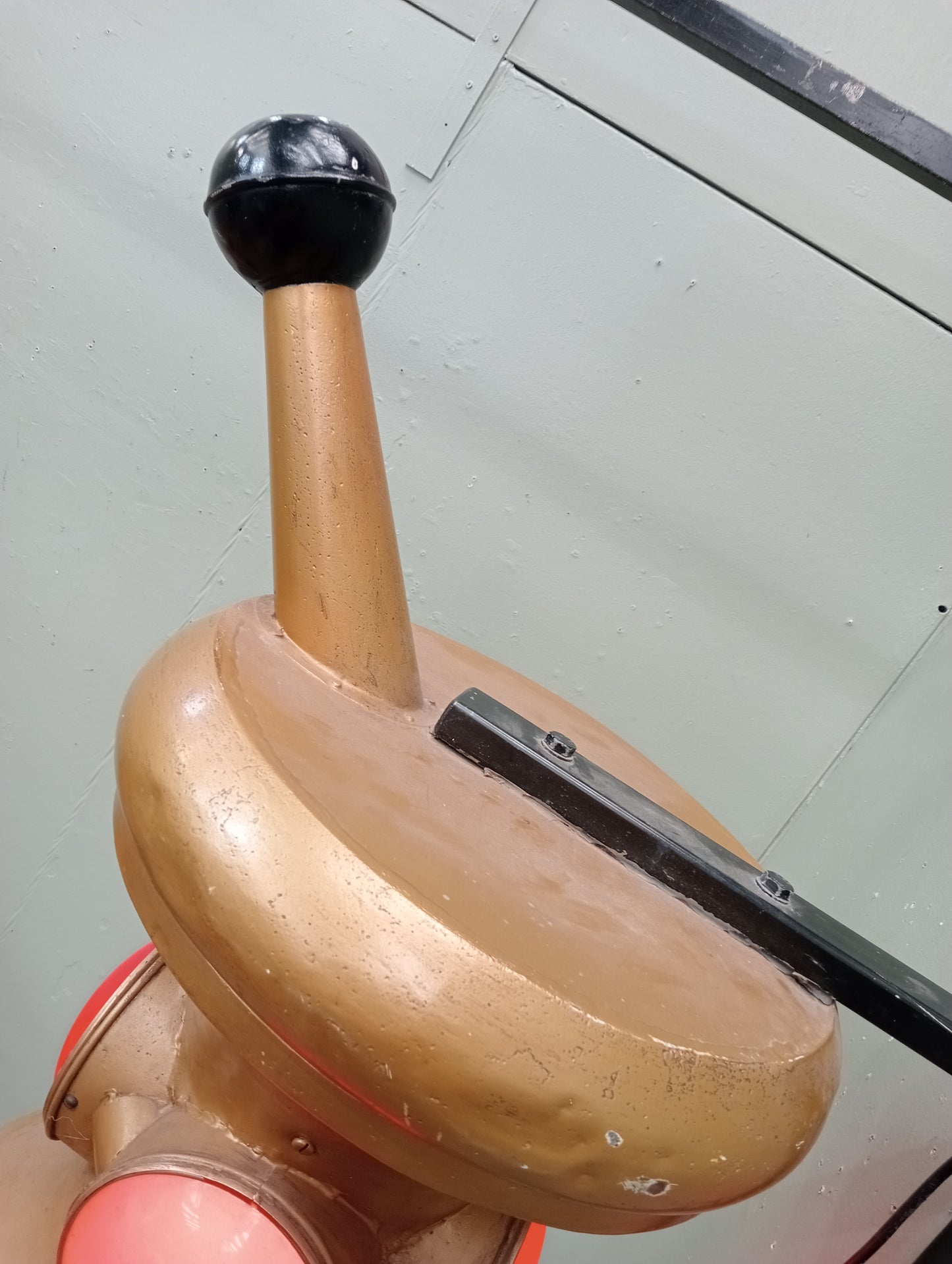 Rare early 20th C pharmacy trade sign in the form of a mortar and pestle. Gilded colour with red lenses on 4 sides. In working order