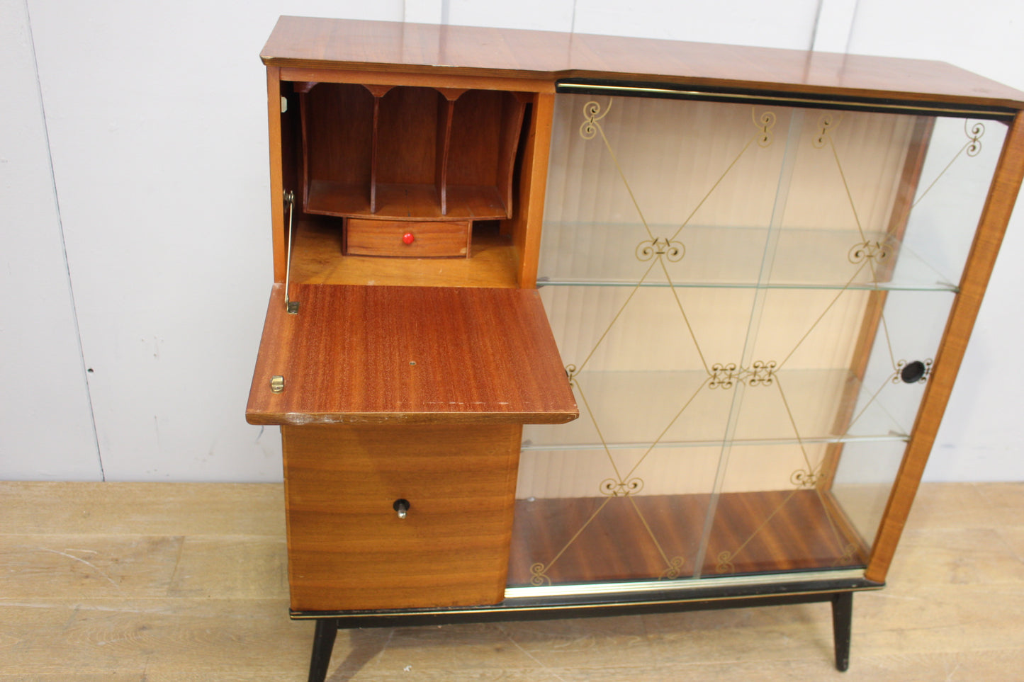Retro teak display cabinet with glass sliding doors and three drawers