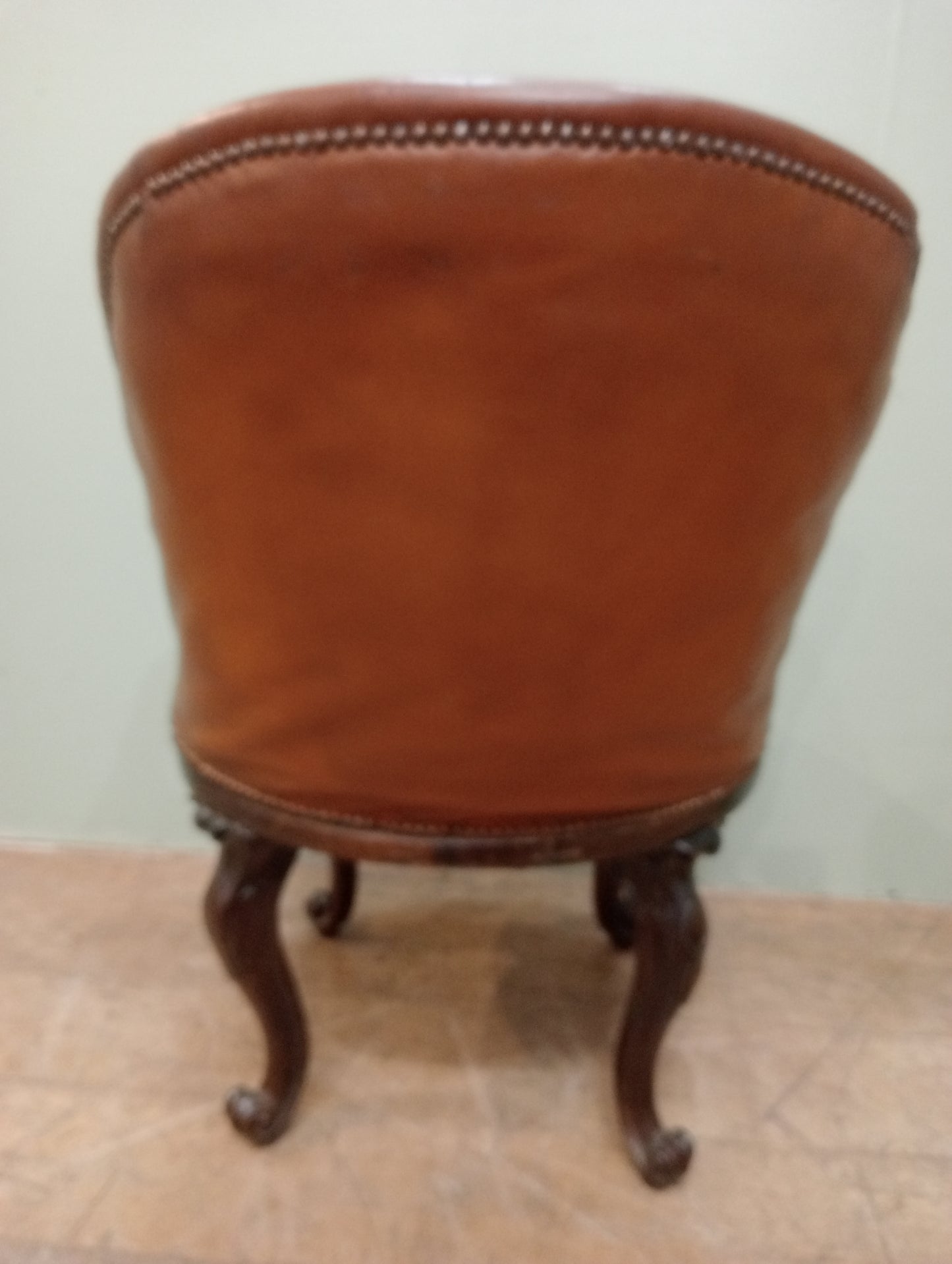 Victorian walnut swival library chair tan leather on scroll cabriole legs