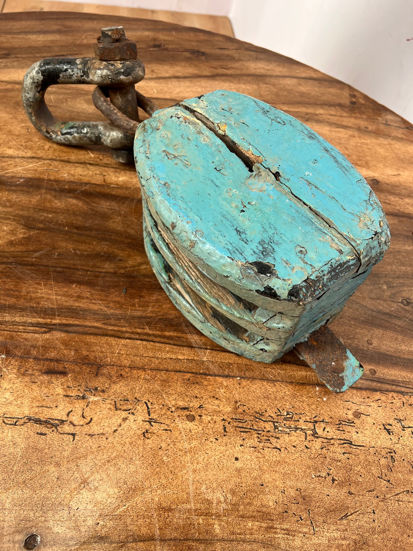 Vintage wooden pulley with primitive block and tackle