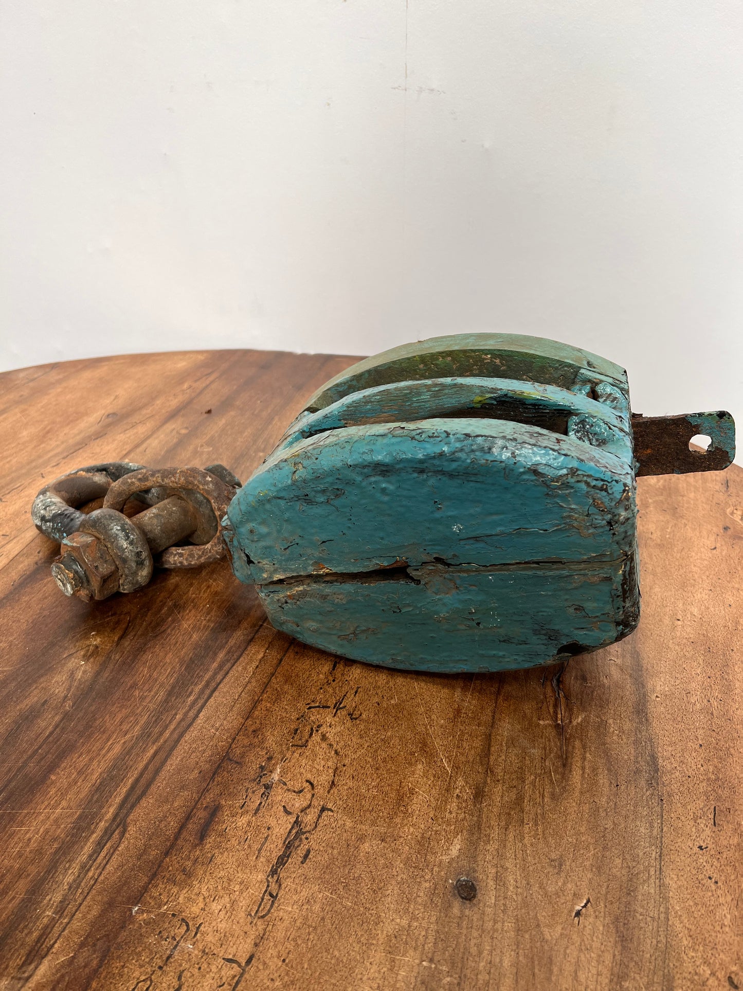 Vintage wooden pulley with primitive block and tackle