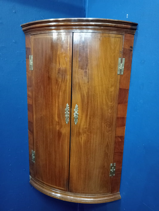 Walnut veneered  glazed hanging corner cabinet
