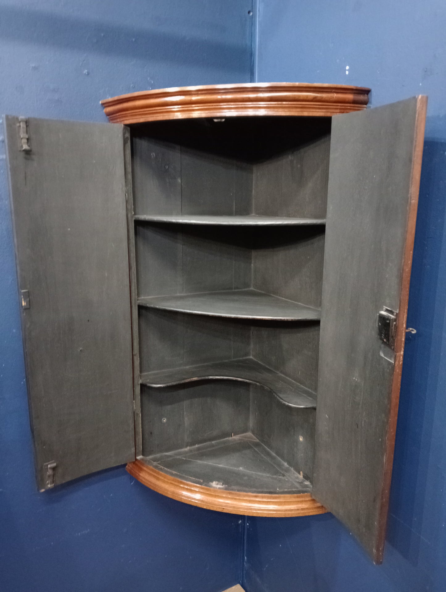 Walnut veneered glazed hanging corner cabinet