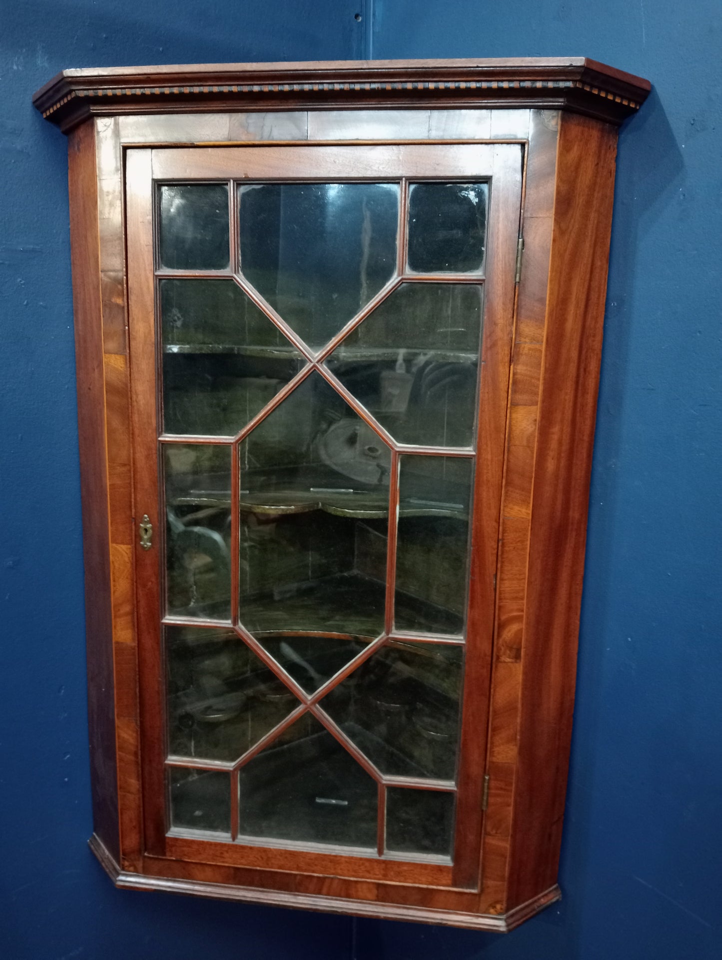 Walnut veneered hanging corner cabinet