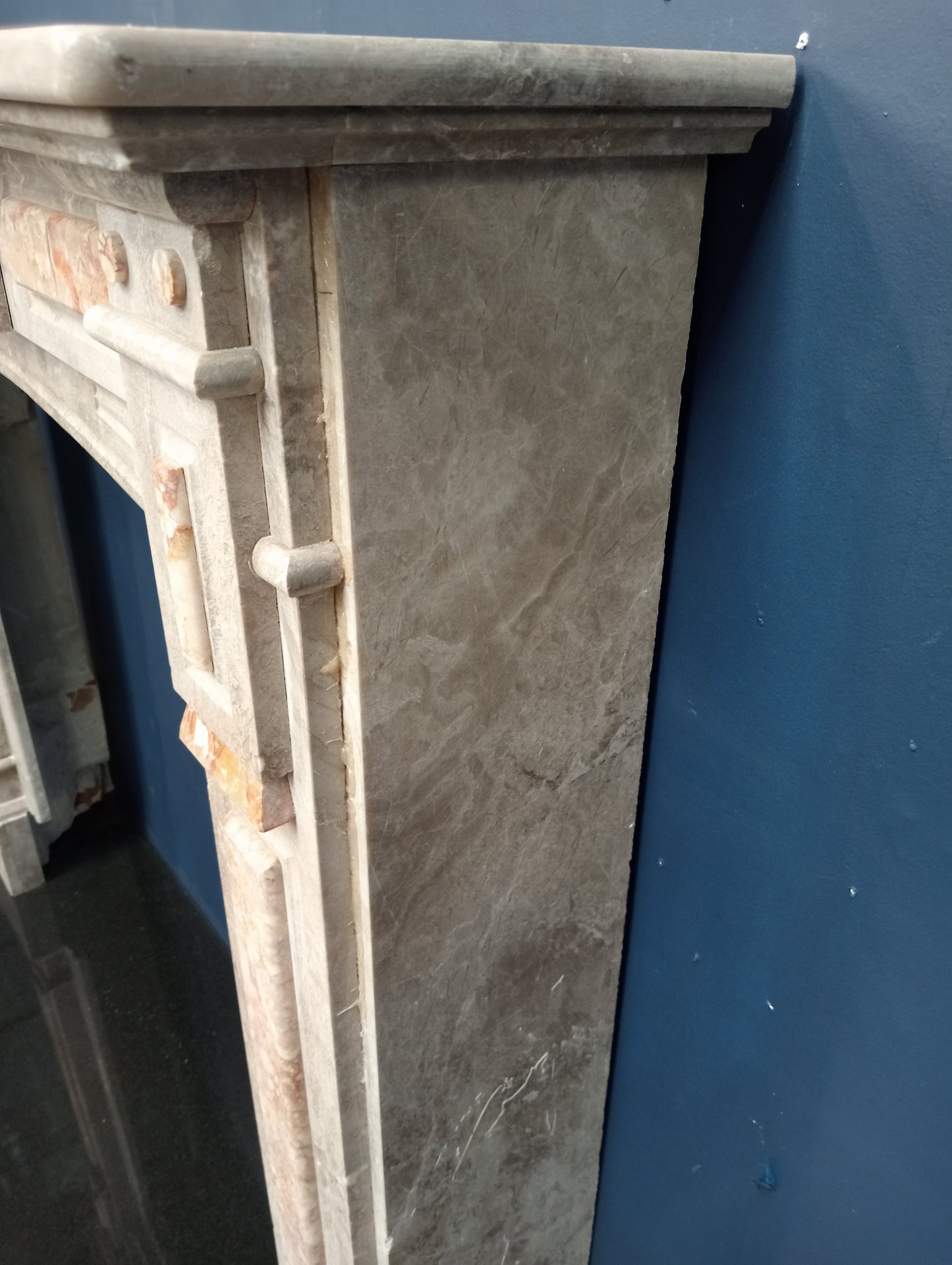 White carrara marble with pink marble inlays built and carved by hand
