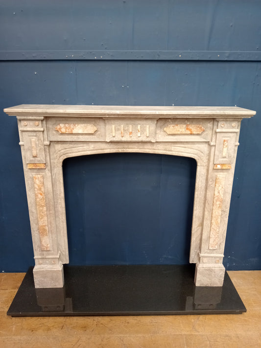 White carrara marble with pink marble inlays built and carved by hand