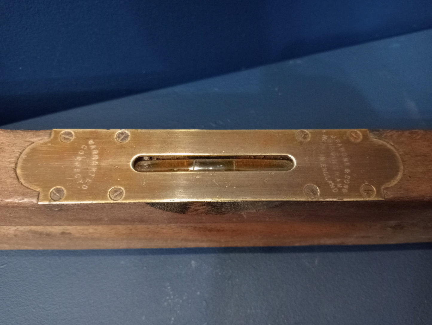 Wood and brass spirit level