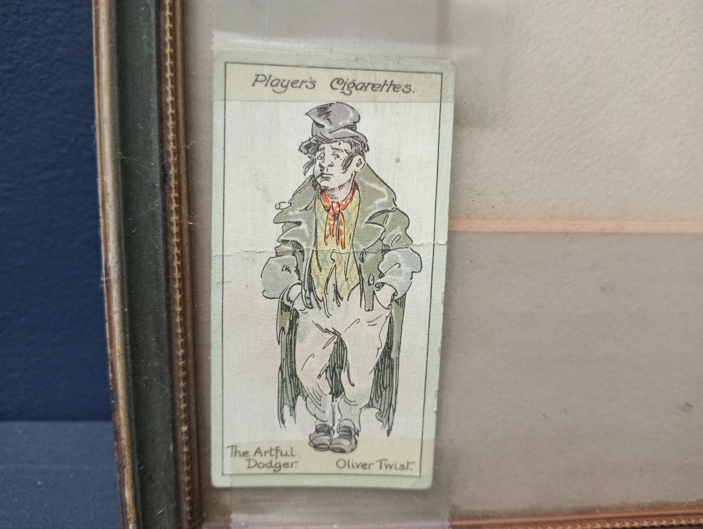 20th C pen and ink drawing of the artful dodger from oliver twist from attatched cigarette card signed